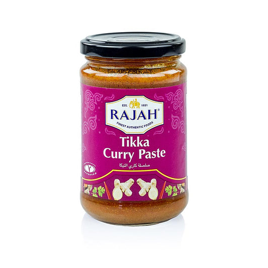 Alt text: A 300g jar of Rajah Tikka Paste, a flavorful and aromatic product for creating traditional Indian dishes