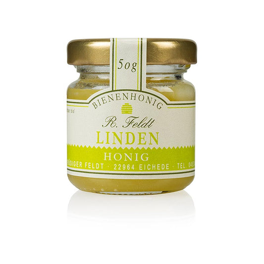 A 50 g portion glass of creamy, light, and robustly fresh Linden honey from Germany, perfect for a taste of summer