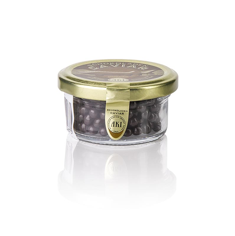 Close-up image of Schokoladen Caviar - Bitterschokoperlen mit Getreidecrackerfüllung, 30 g, showcasing rich dark chocolate pearls filled with crunchy cereal crackers, perfect for indulgent snacking