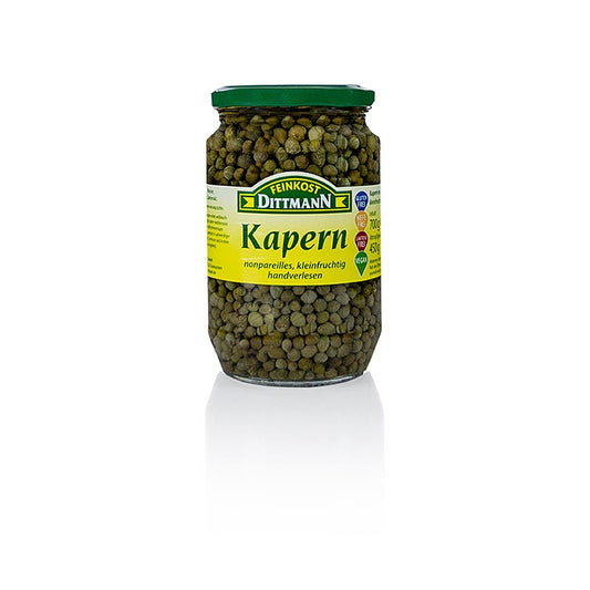 A close-up image of Dittmann's 700g Kapern Nonpareilles product, with green capers ranging from 4-7mm in size, perfect for adding a bold, tangy flavor to a variety of dishes