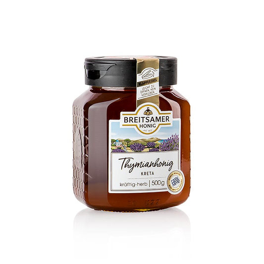 A 500g jar of Breitsamer Honig Mediterraner Sommer showcasing thyme from Crete, a high-quality honey product perfect for adding a taste of the Mediterranean to your dishes