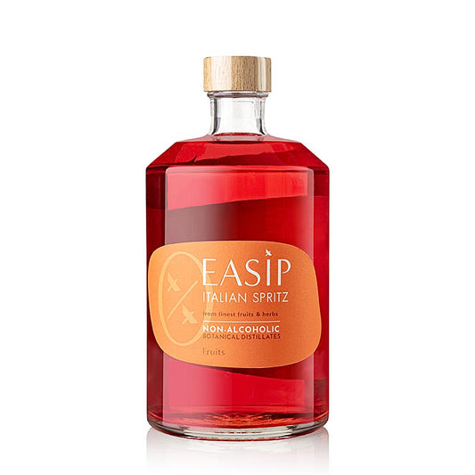 Close-up of EASIP FRUITS Non Alcoholic Botanical Distillates 700 ml bottle with fruits and herbs, alkoholfrei (English)